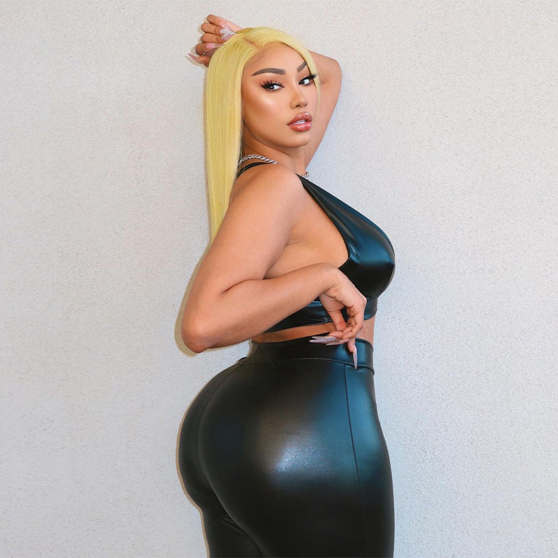 Turn heads in this sleek black PU leather two-piece set. Perfect for nightlife or bold street style.