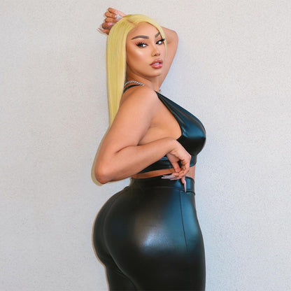 Turn heads in this sleek black PU leather two-piece set. Perfect for nightlife or bold street style.