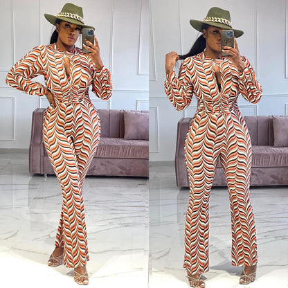 🌟 Cutout Nipped Waist Smocked Print Flared Jumpsuit