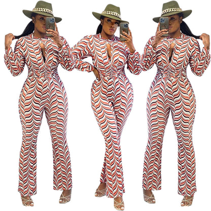 🌟 Cutout Nipped Waist Smocked Print Flared Jumpsuit