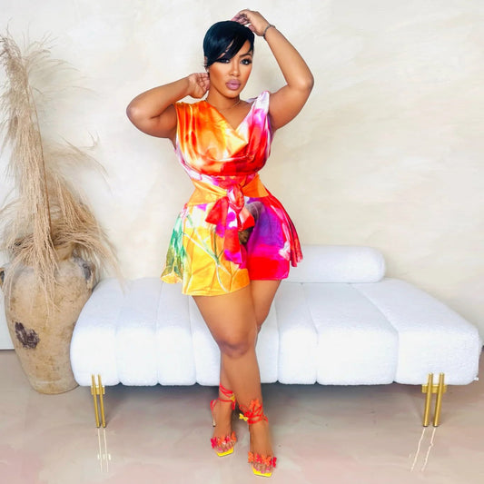 "Sunset Sizzle Oblique Shoulder Wrap Romper – Bullish Exclusive"